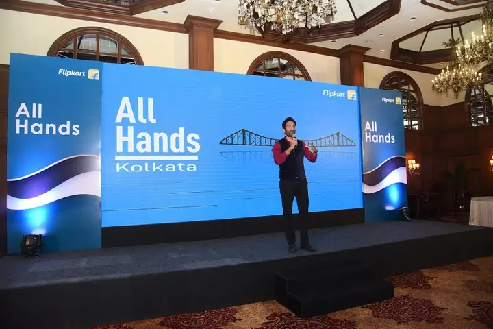 Speaker on stage at a Flipkart All Hands in Kolkata